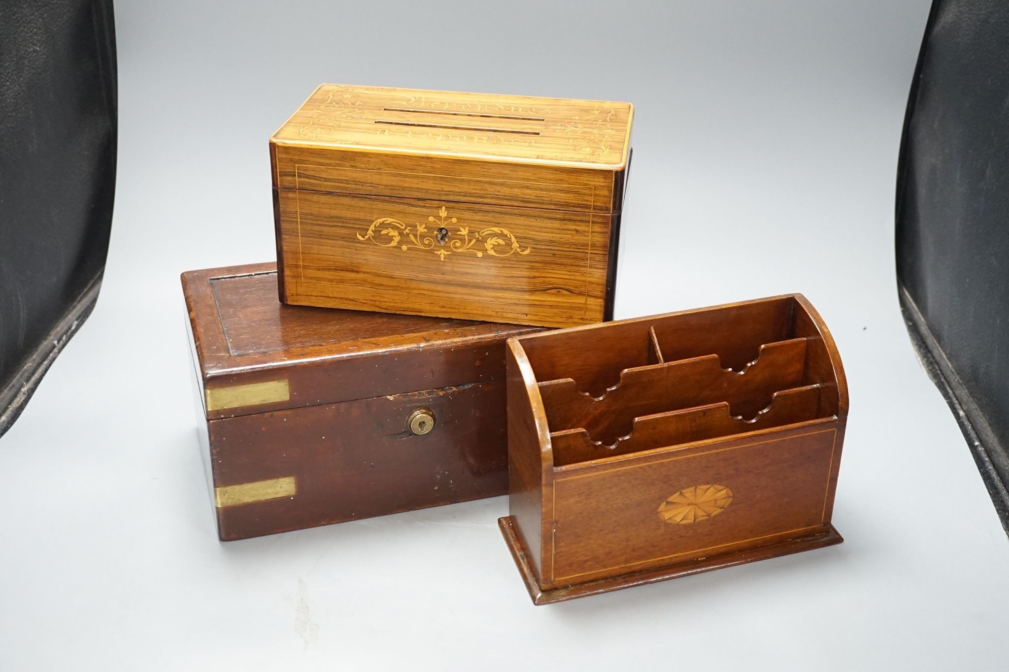 A 19th century French rosewood and marquetry letters box, an inlaid stationary rack and a brass-mounted box 28cm